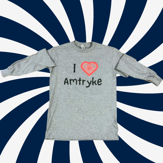 Grey long sleeve jersey knit tee-shirt. It says I love Amtryke. Love is symbolized with a red heart shaped bicycle wheel.
