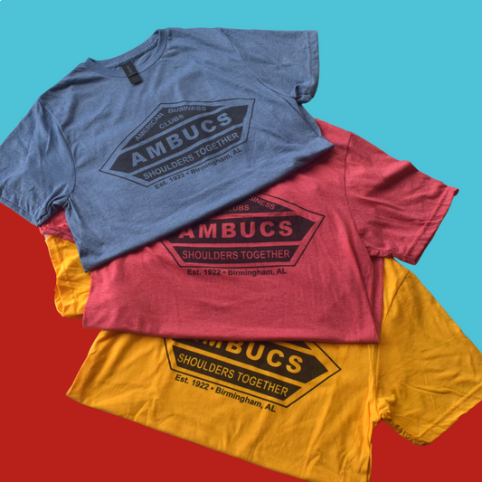 Blue, red and yellow t-shirts with the classic AMBUCS logo and motto "Shoulders Together"